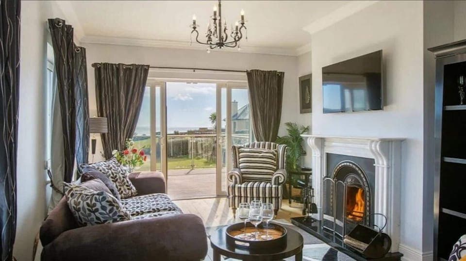 Villa | Living area | TV, fireplace