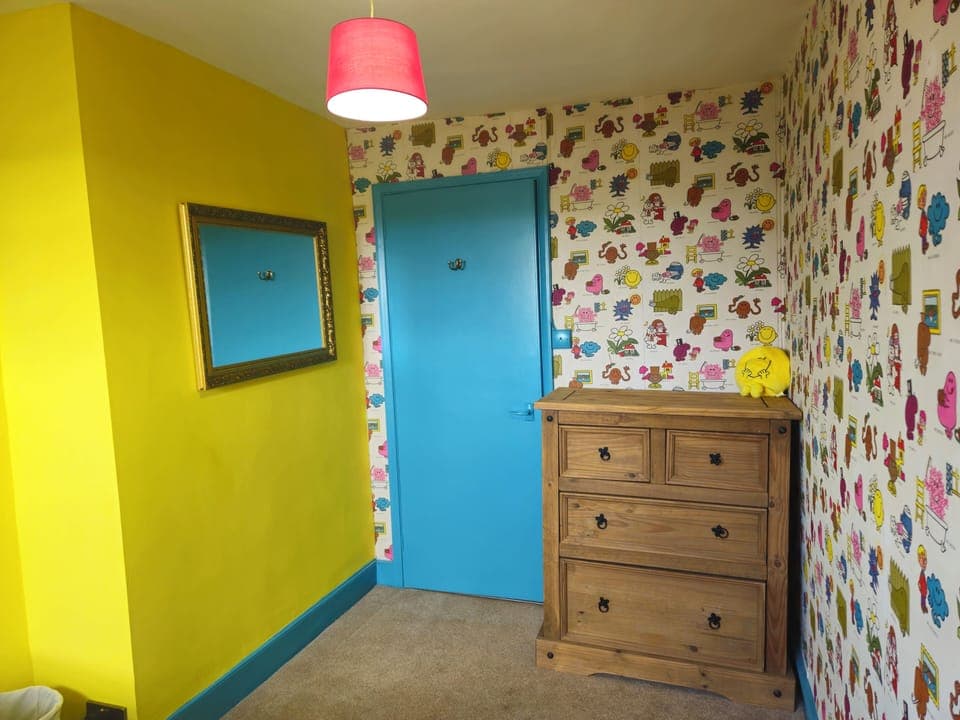 Retro Roost, double room with vintage wall paper