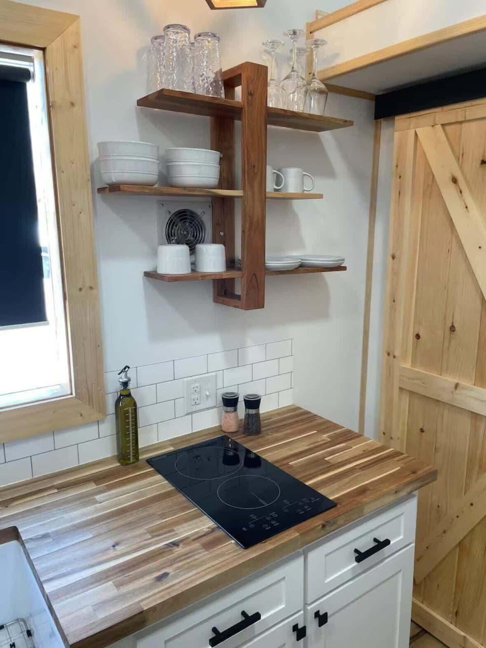 Kitchen: Modern appliances and rustic charm await culinary adventures in this inviting space!
