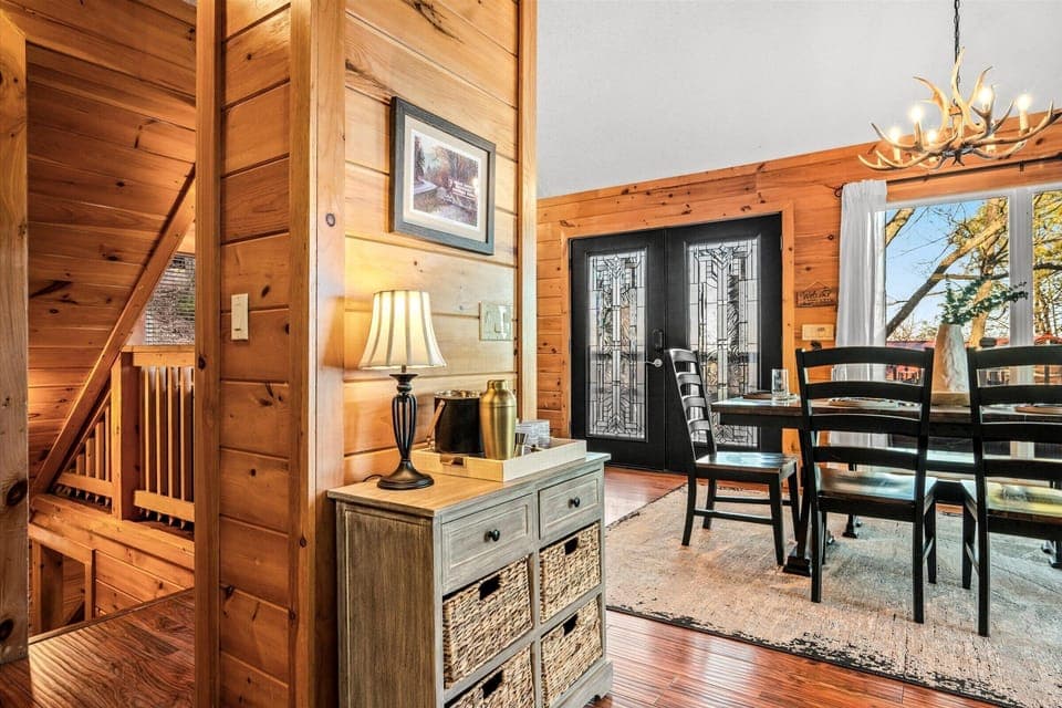 A cozy welcome awaits you with rustic charm and soft lighting from the moment you enter.