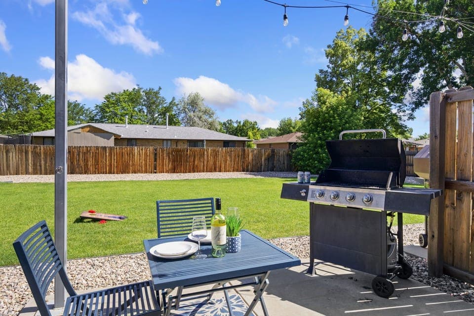 Back Patio | Grill, Bistro Dining Table, String Lights, Yard Games (1751)