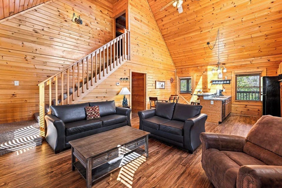 Cozy living space with leather seating, Smart TV, and gas fireplace 