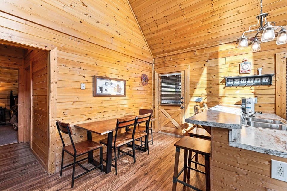 Cozy living space with leather seating, Smart TV, and gas fireplace 