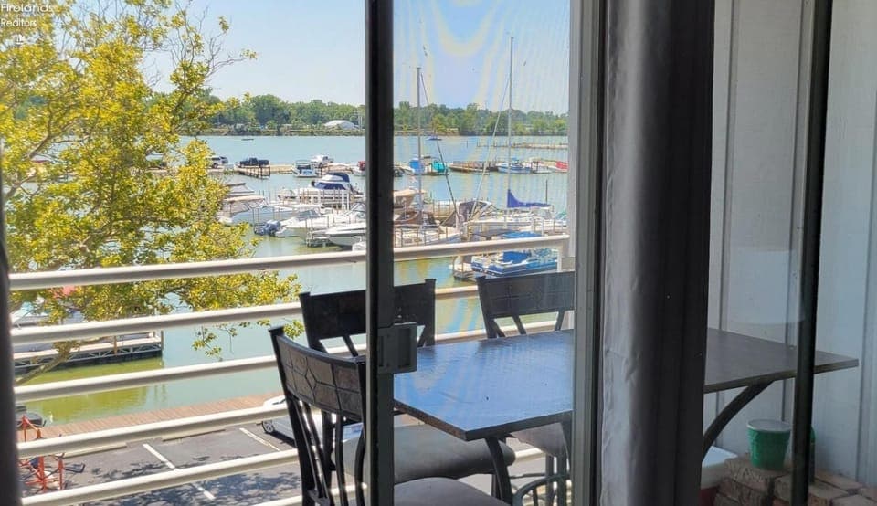 Covered balcony off living room with a stunning view