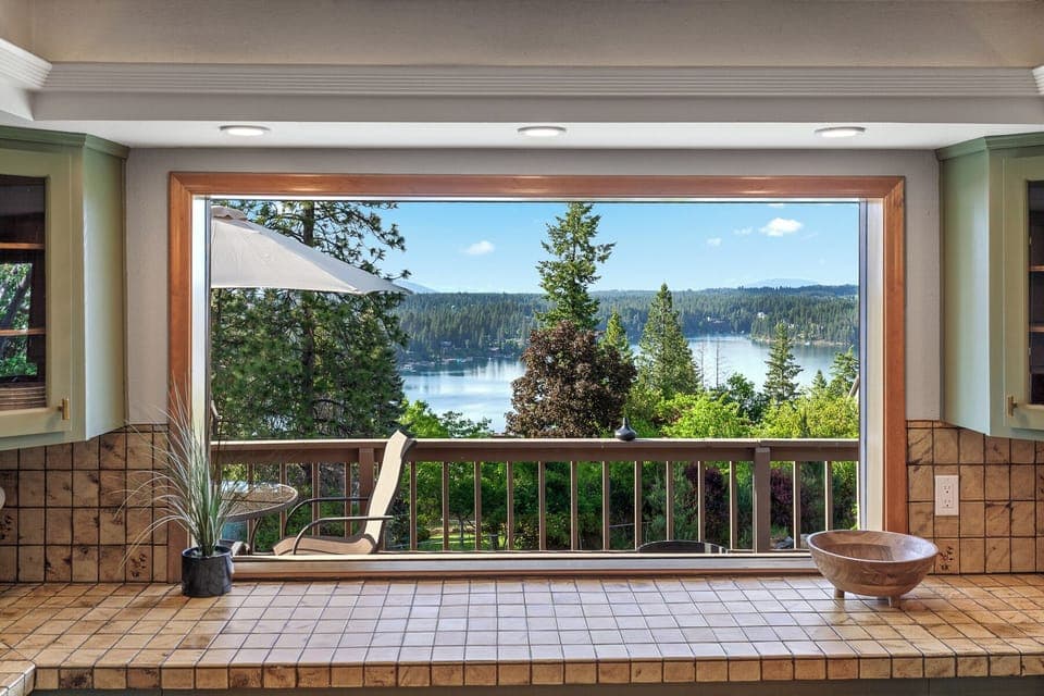 Kitchen View - Soak in the gorgeous lake views from the kitchen