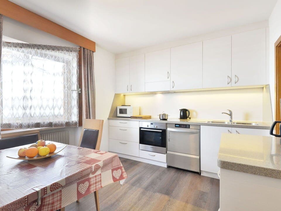 Interior Design, Furniture, Flooring, Kitchen, Wood, Floor, Ceiling, Countertop, Room, Cabinetry