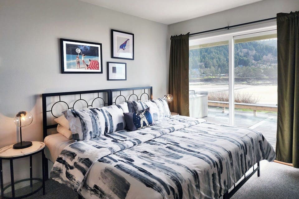 Another bedroom with access to the deck and hot tub has a king bed that can be split into two twins.