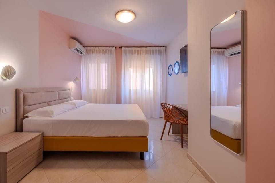 Family Room, Partial Lake View | In-room safe, soundproofing, free WiFi, bed sheets