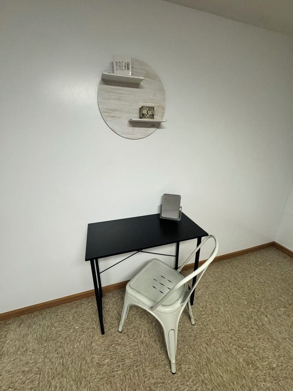 Desk and chair for working or getting ready. 