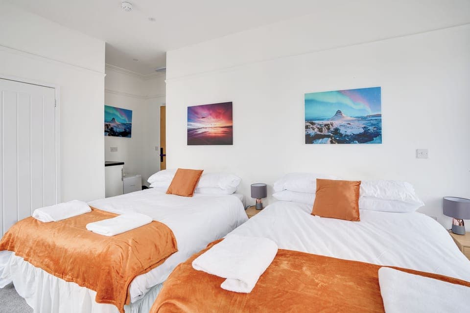 Family Room, 2 Double Beds | Iron/ironing board, free WiFi, bed sheets