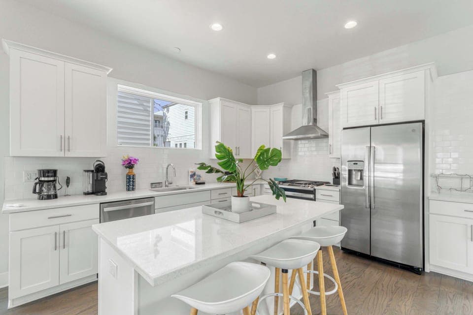 Kitchen: Main floor,drip coffee maker, keurig, crockpot, toaster, cooking utensils, tableware