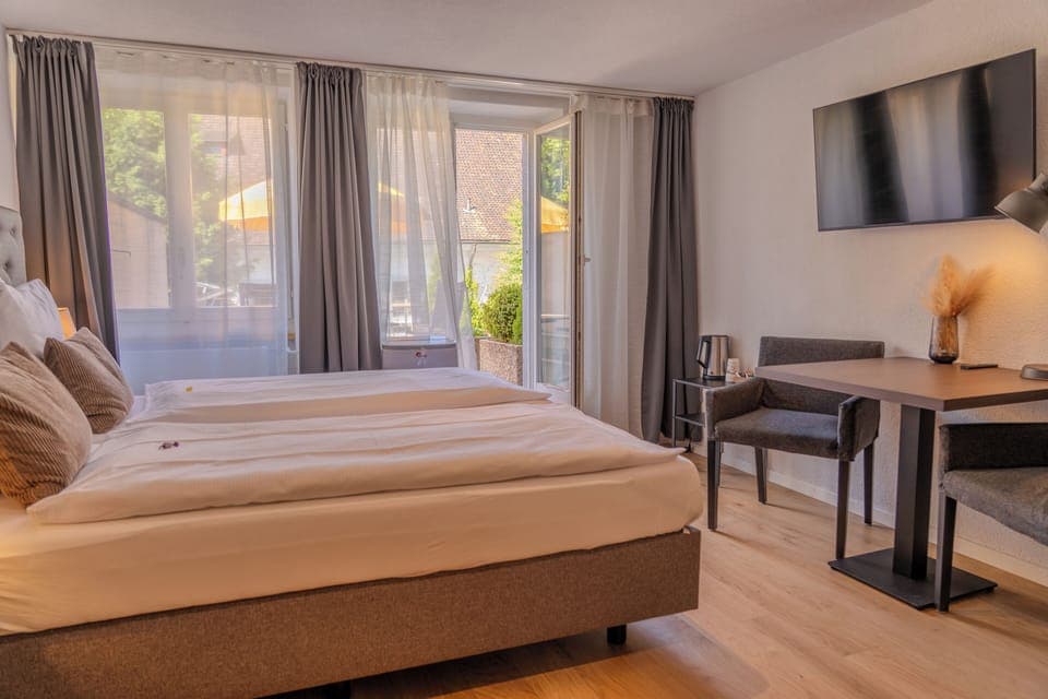 Deluxe Double Room | Minibar, desk, iron/ironing board, free cribs/infant beds