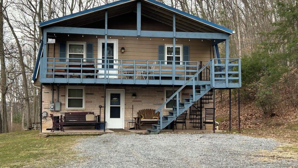 2-story surrounded by woods