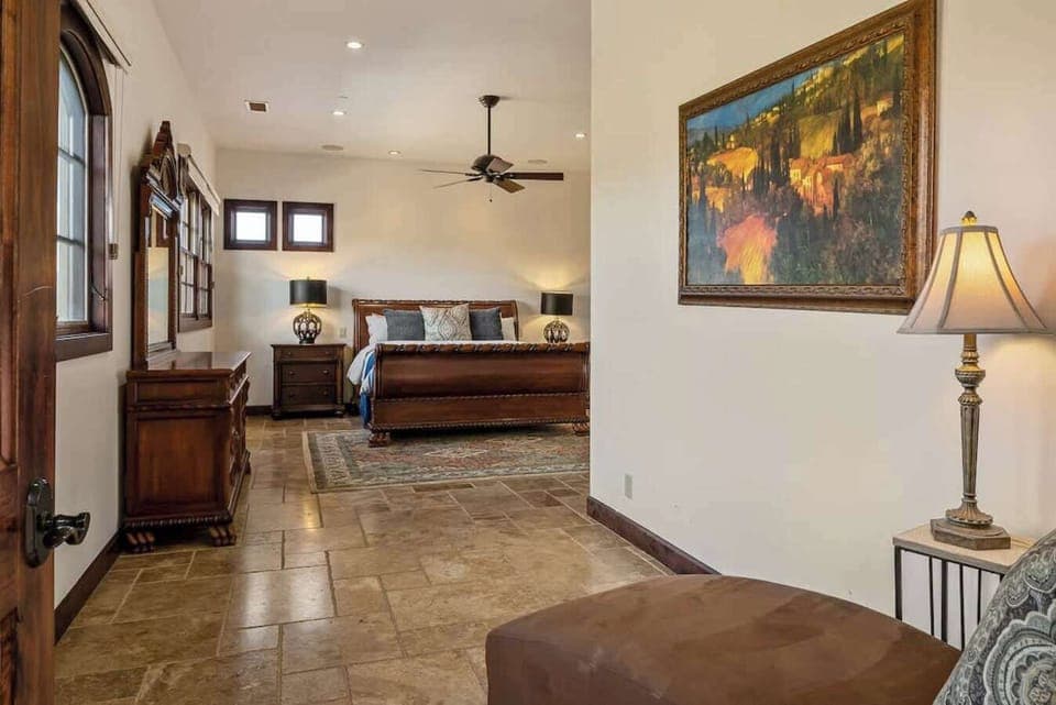 Bedroom with a king-sized bed, good view and a ceiling fan.