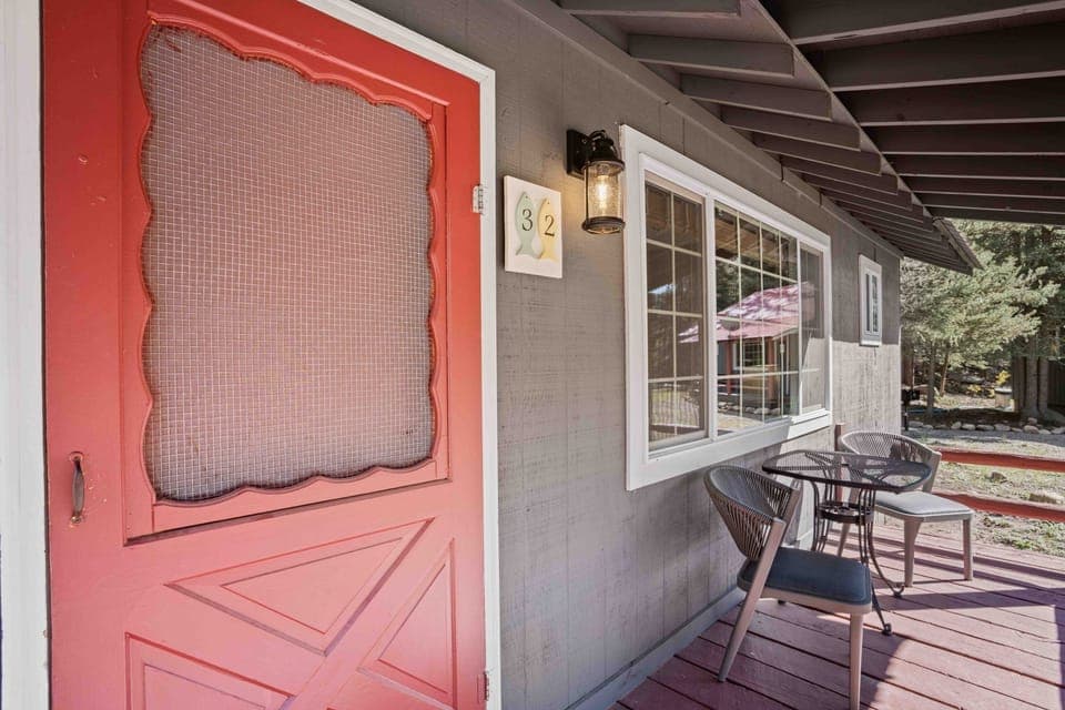 Sip morning coffee by the door in crisp mountain air.