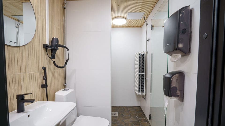 Hair dryer, slippers, towels, soap