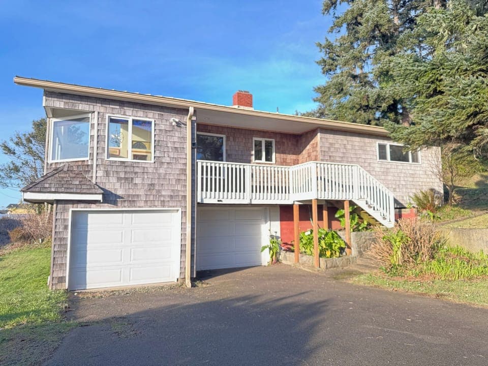 Driveway and stairs to front door.