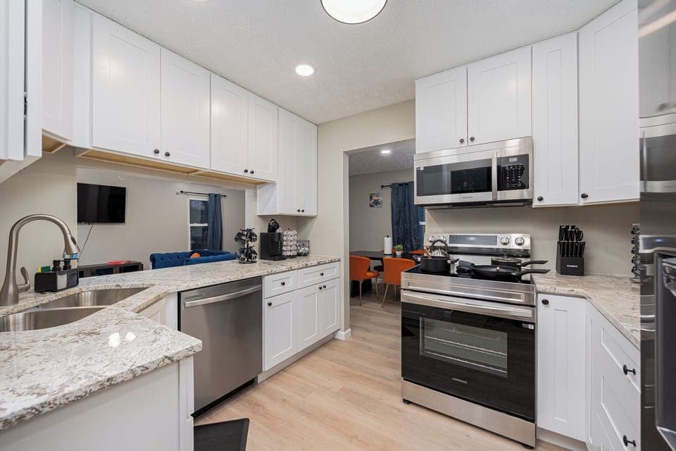 Custom-built kitchen with New electric burner stove and New refrigerator
