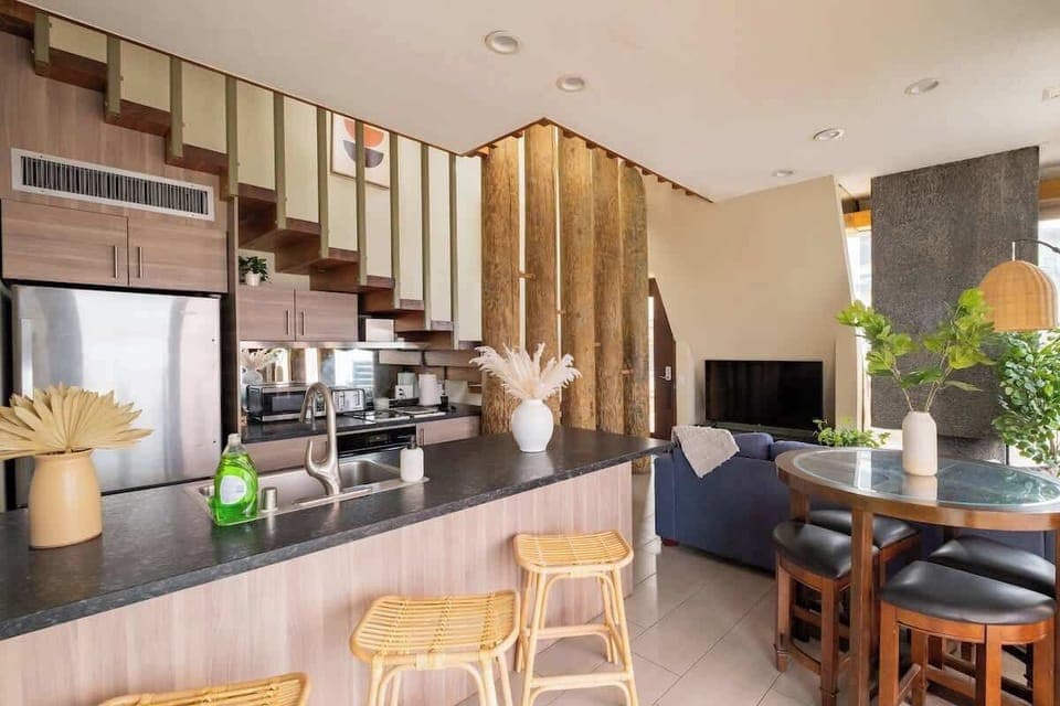 Sit up at the breakfast bar and keep the chef company as they cook