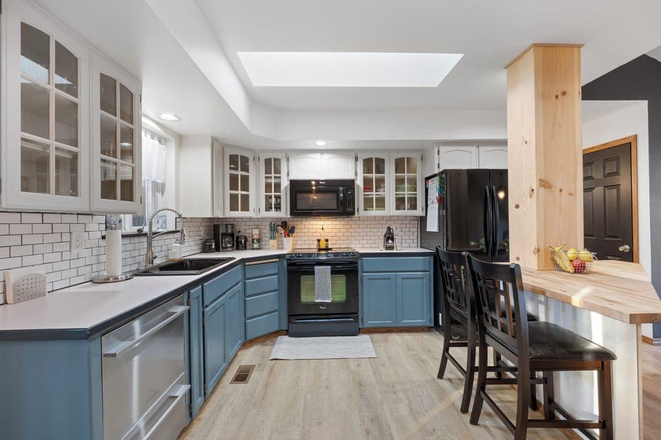 The open kitchen offers ample space for cooking and enjoying time together.