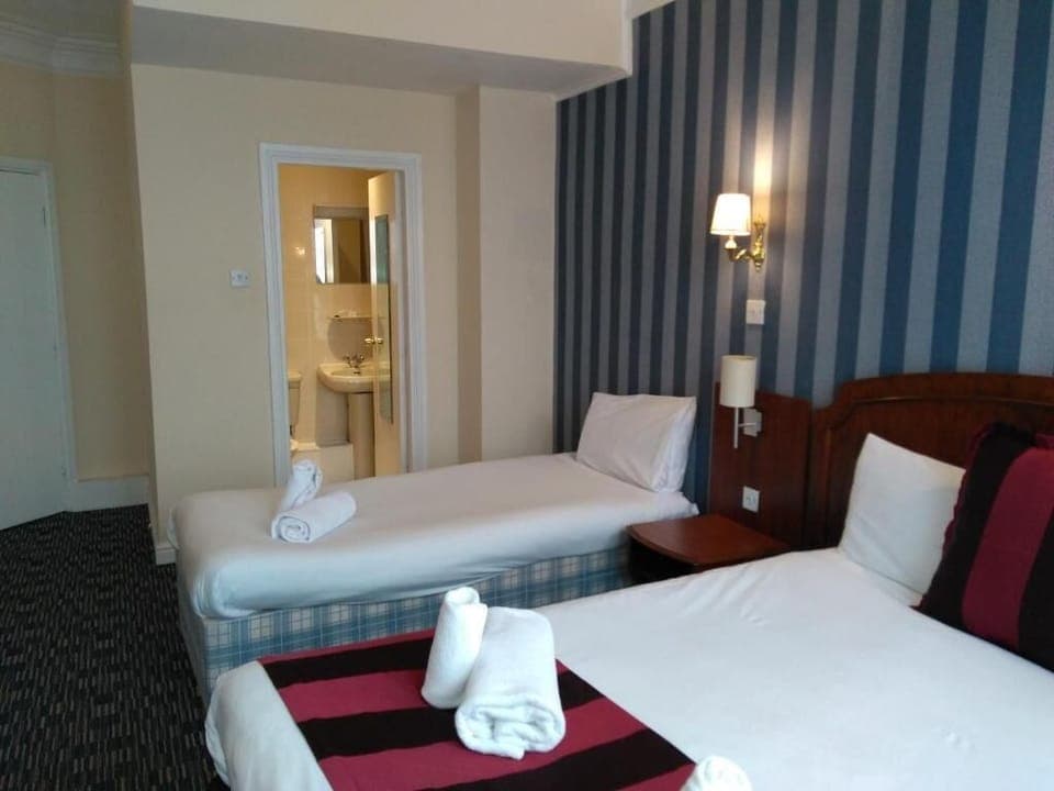 Desk, laptop workspace, free WiFi, bed sheets