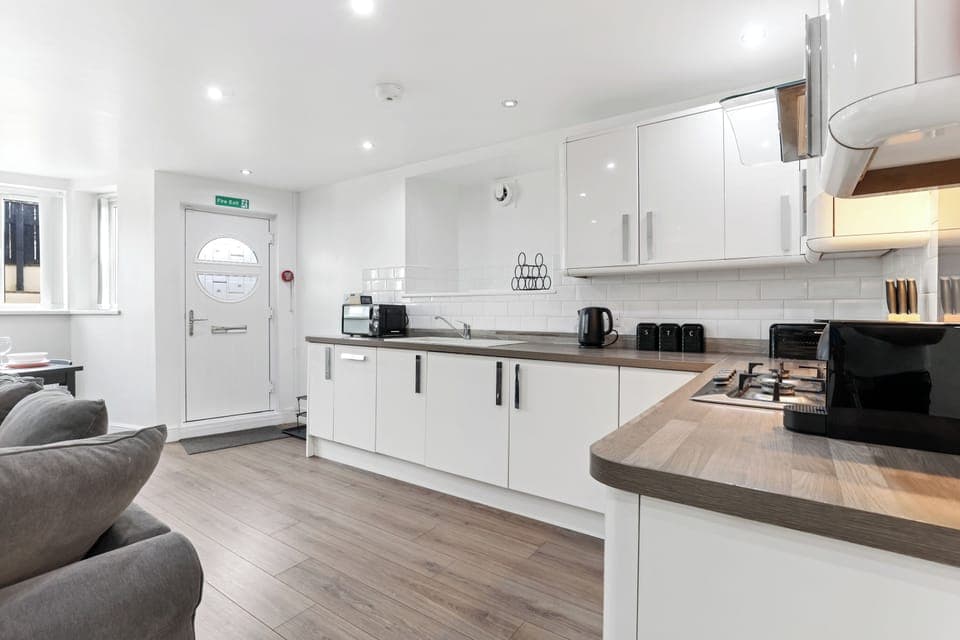 Apartment, Patio | Private kitchen | Espresso maker, electric kettle, toaster, dining tables