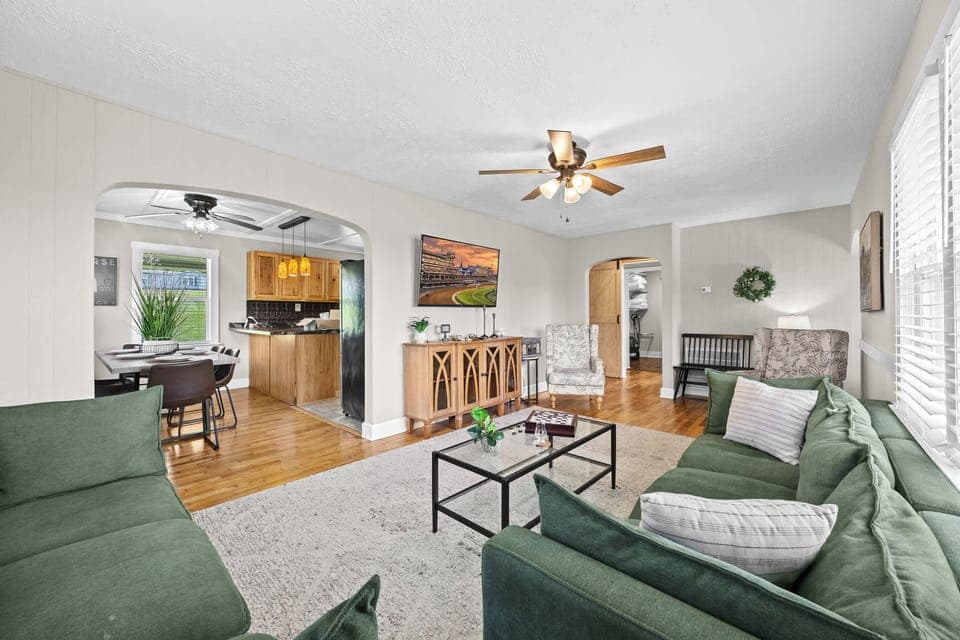 Living Room: Our spacious living area, bathed in natural light, is your perfect haven for relaxation, connection, and creating unforgettable memories.