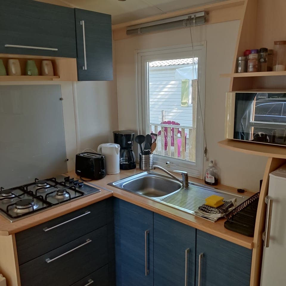 Mobile Home, 2 Bedrooms, Kitchen, Resort View | Private kitchen | Full-size fridge, microwave, stovetop, coffee/tea maker