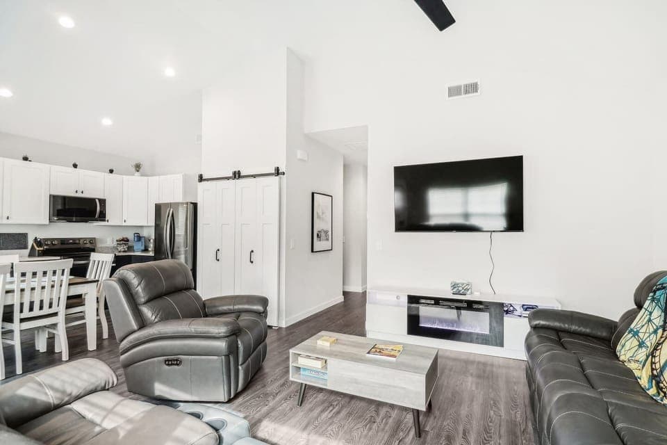 Lots of space in living room, kitchen, dining table, and pantry