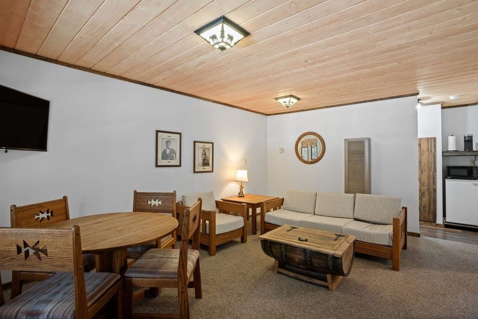 Gather, lounge, and reconnect in this rustic, spacious living area.