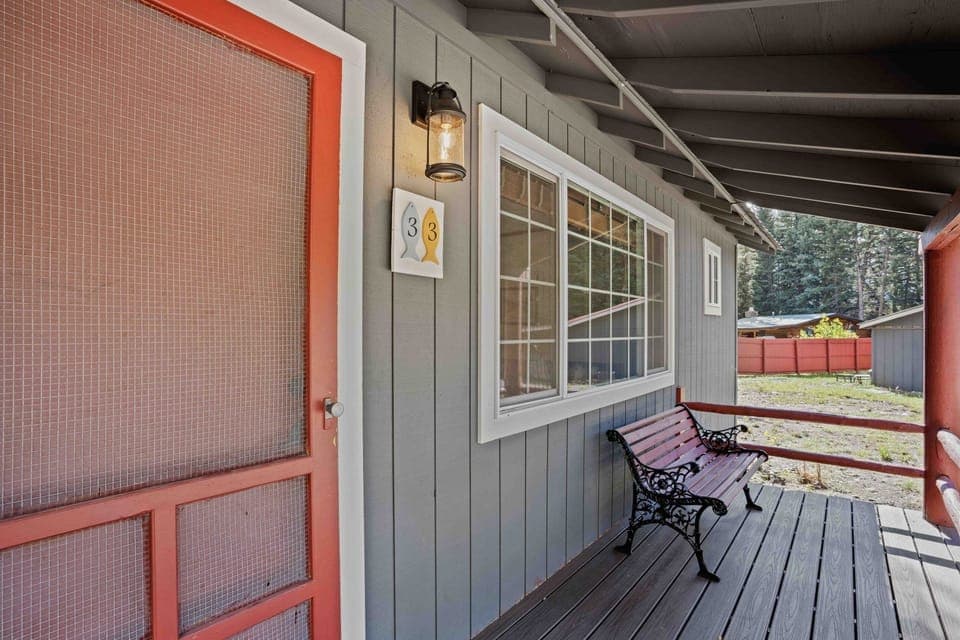 Sip morning coffee on the covered porch bench.