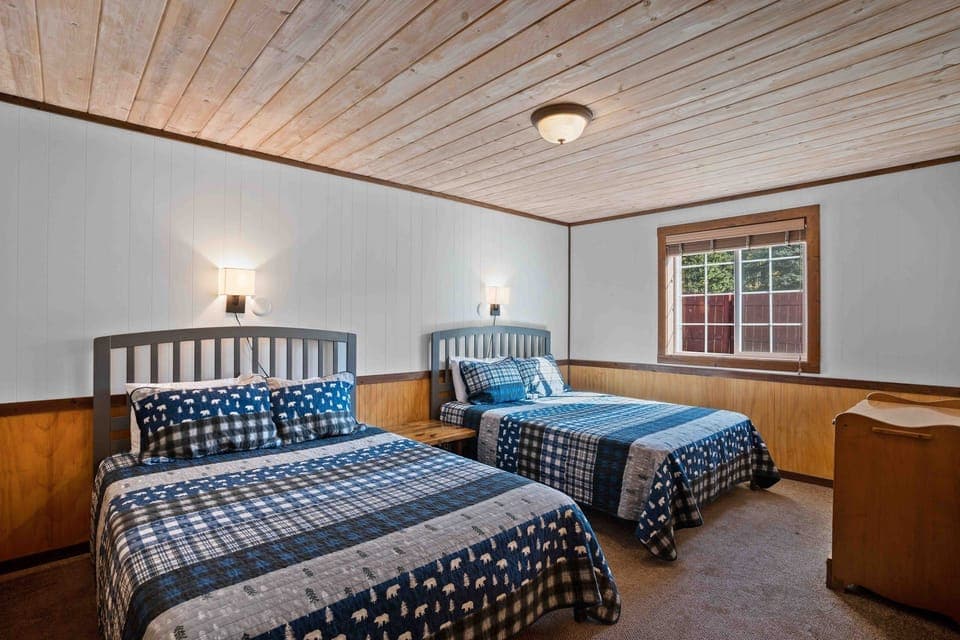 Unwind in cozy beds after a mountain adventure.