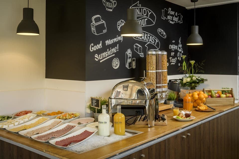 Breakfast and dinner served, garden views 