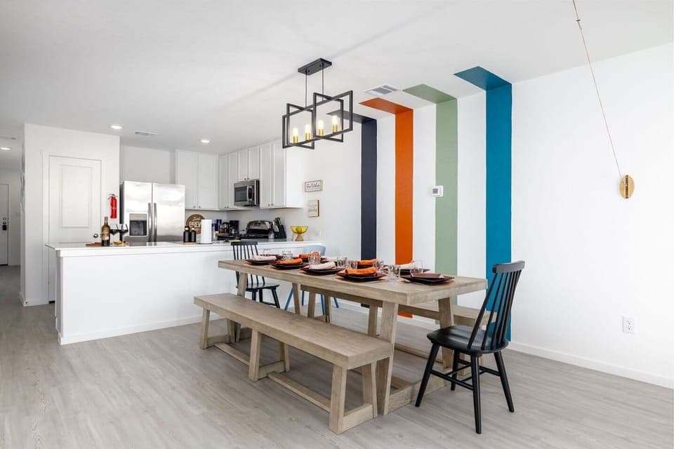 The Dining area has a large table and benches to accommodate 10 guests. We also provide a Chicco easy clean high chair for our littlest guests.