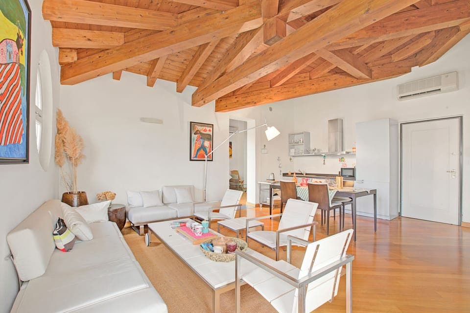 Family Apartment, Multiple Bedrooms, 2 Bathrooms, Lakeside (Morgante Salò-Lake view & parking) | Living area | 21-inch flat-screen TV with cable channels, TV