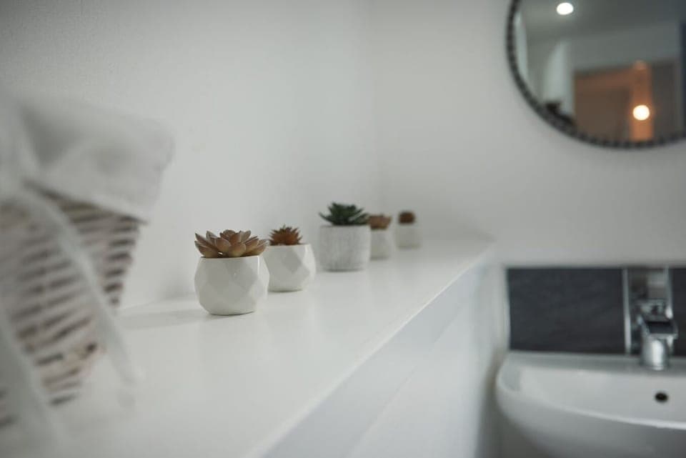 Thoughtfully curated décor adds a warm and welcoming touch to the space, creating a calming atmosphere where every little detail is designed to make you feel at home.