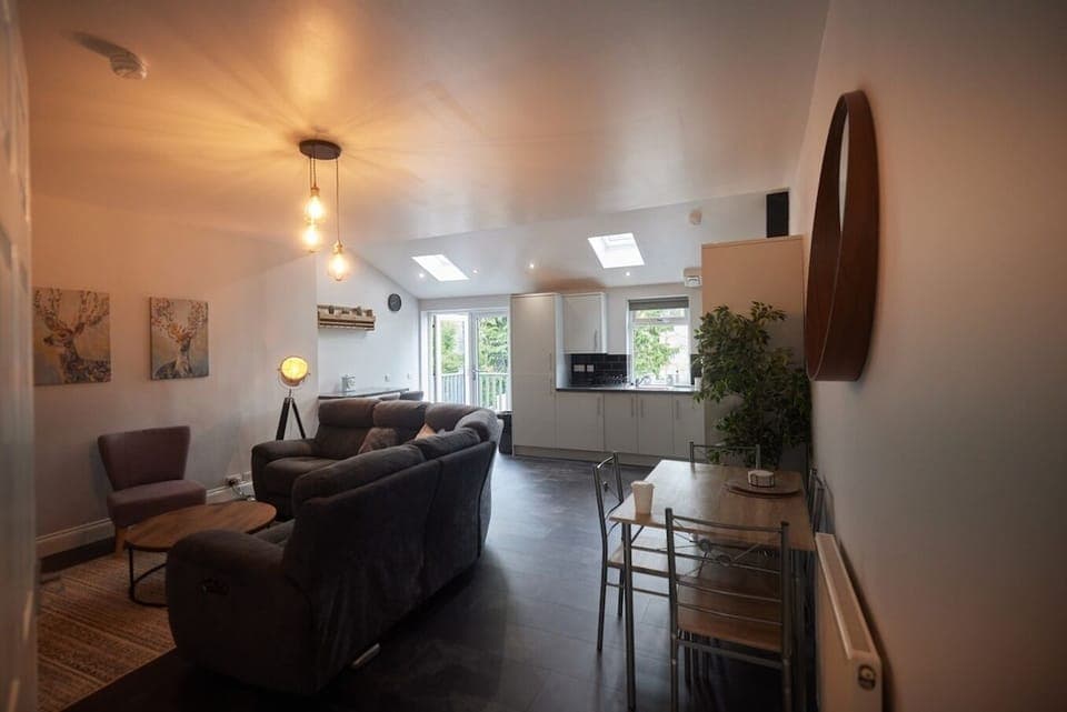 A bright and welcoming living room designed for relaxation and socializing.