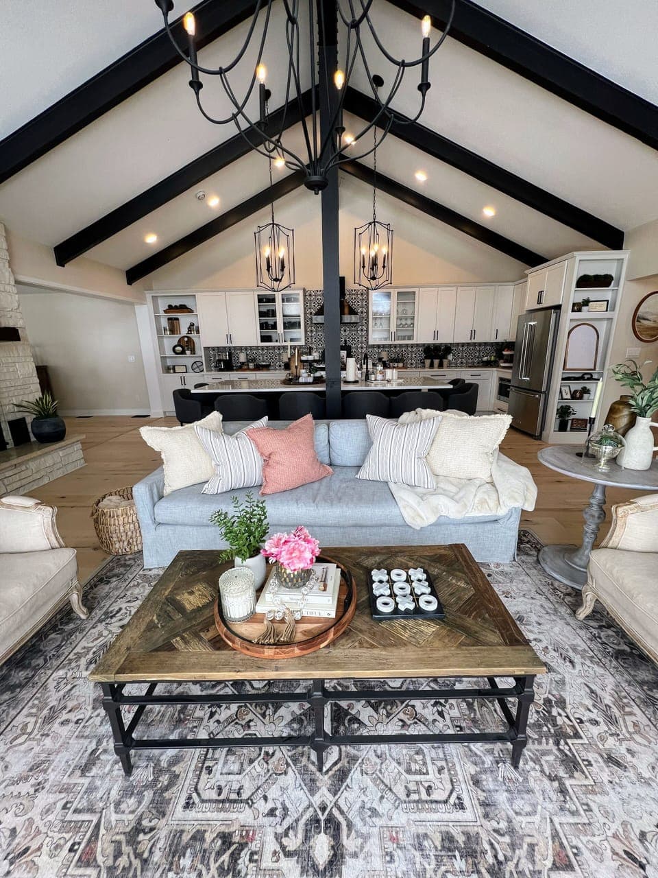 The large kitchen area includes a cozy seating area with amazing views.
