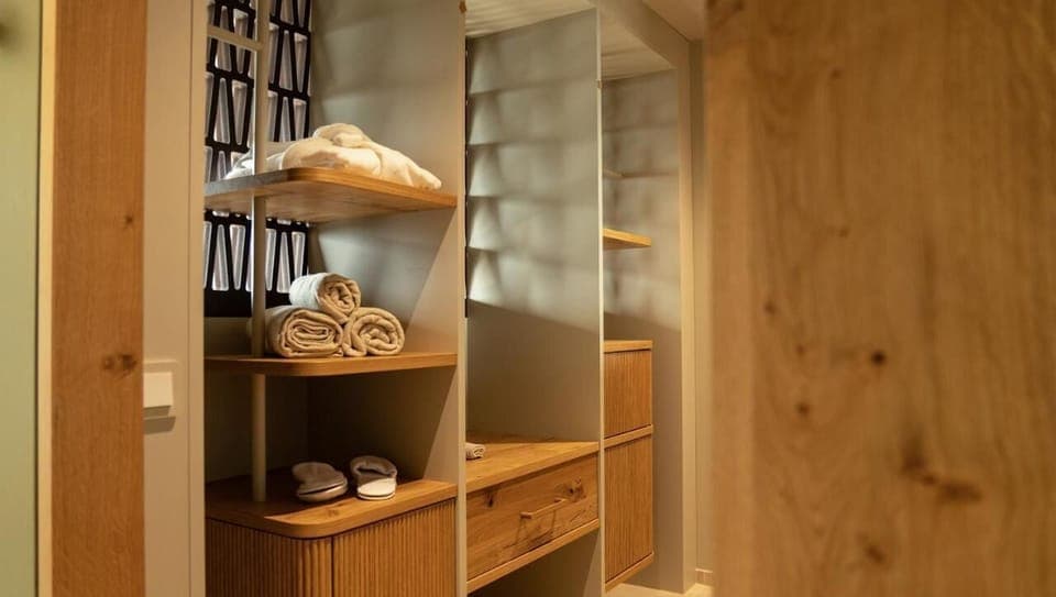 Hair dryer, bathrobes, slippers, towels