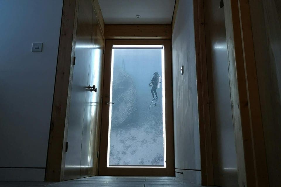 The doors to the rooms in the hallway