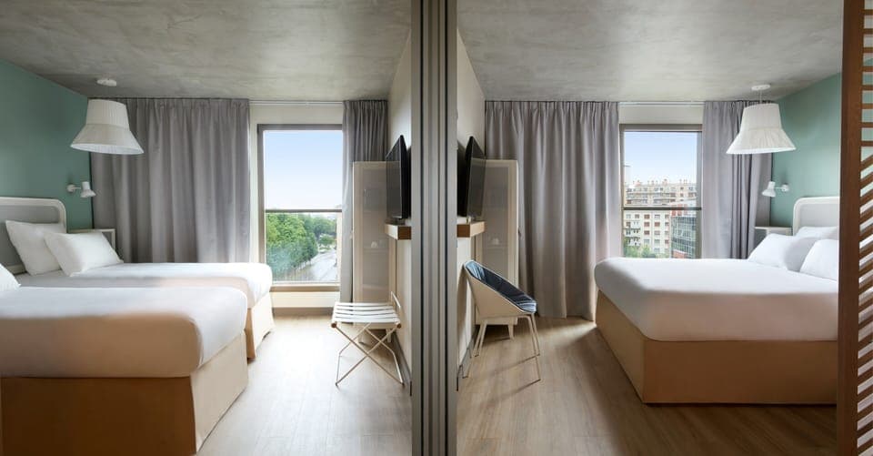 Classic Room including self-service snacks and drinks at the Club | In-room safe, desk, laptop workspace, blackout drapes