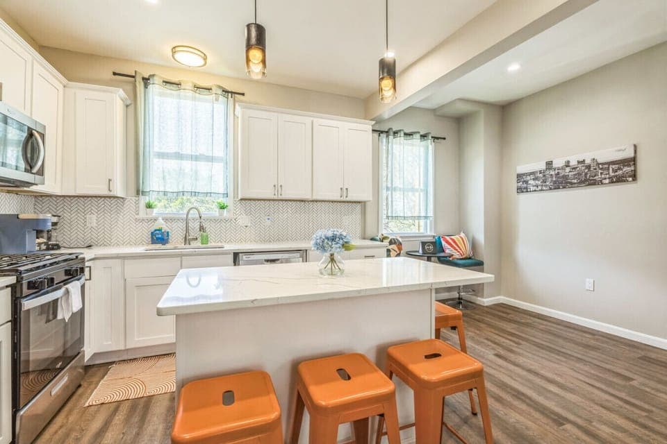 Modern kitchen with sleek finishes and plenty of natural light