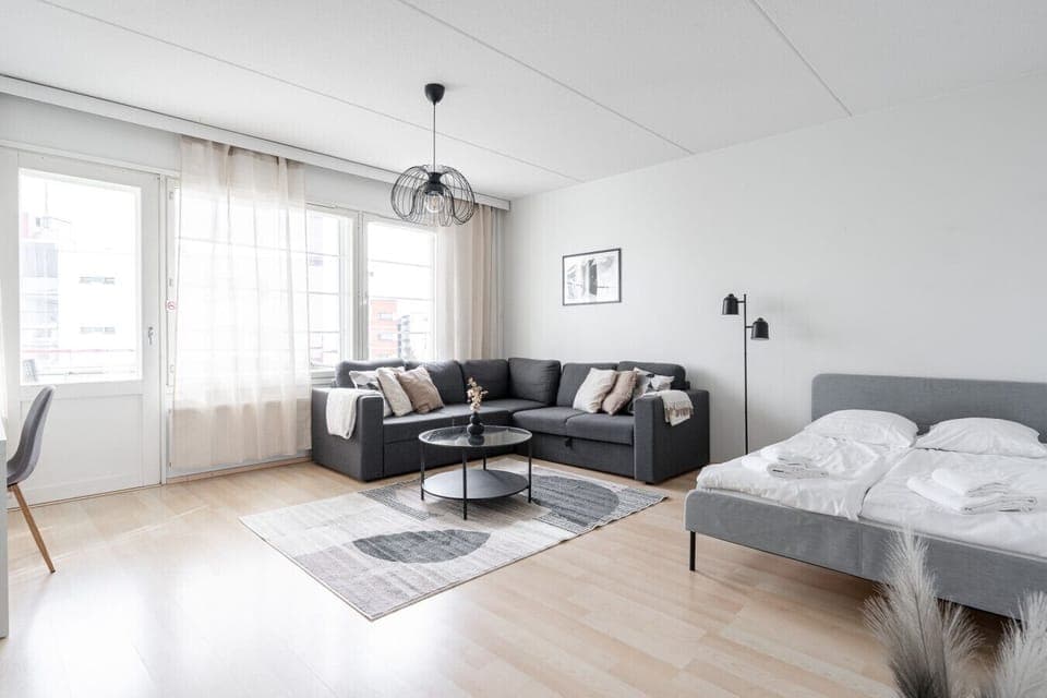 Relax in the spacious living area where the versatile layout comfortably accommodates both lounging and a restful night`s sleep.
