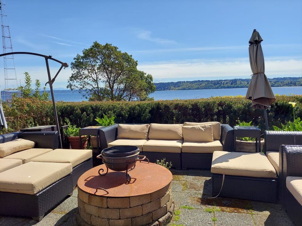 Patio in front of door and view of Tramp Harbor and KVI Beach