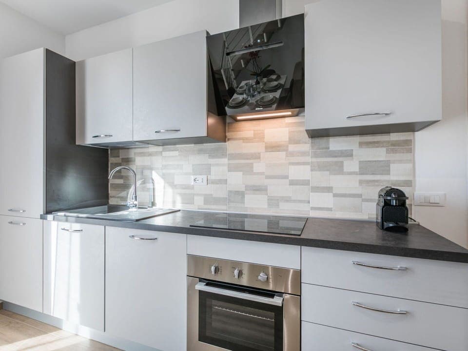 Kitchen, Countertop, Cabinetry, Kitchen Appliance, Major Appliance, Flooring, Interior Design, Drawer, Home Appliance, Floor