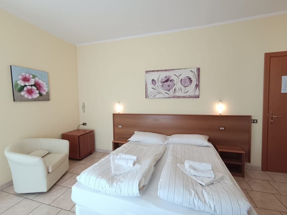 Premium bedding, down comforters, pillowtop beds, in-room safe