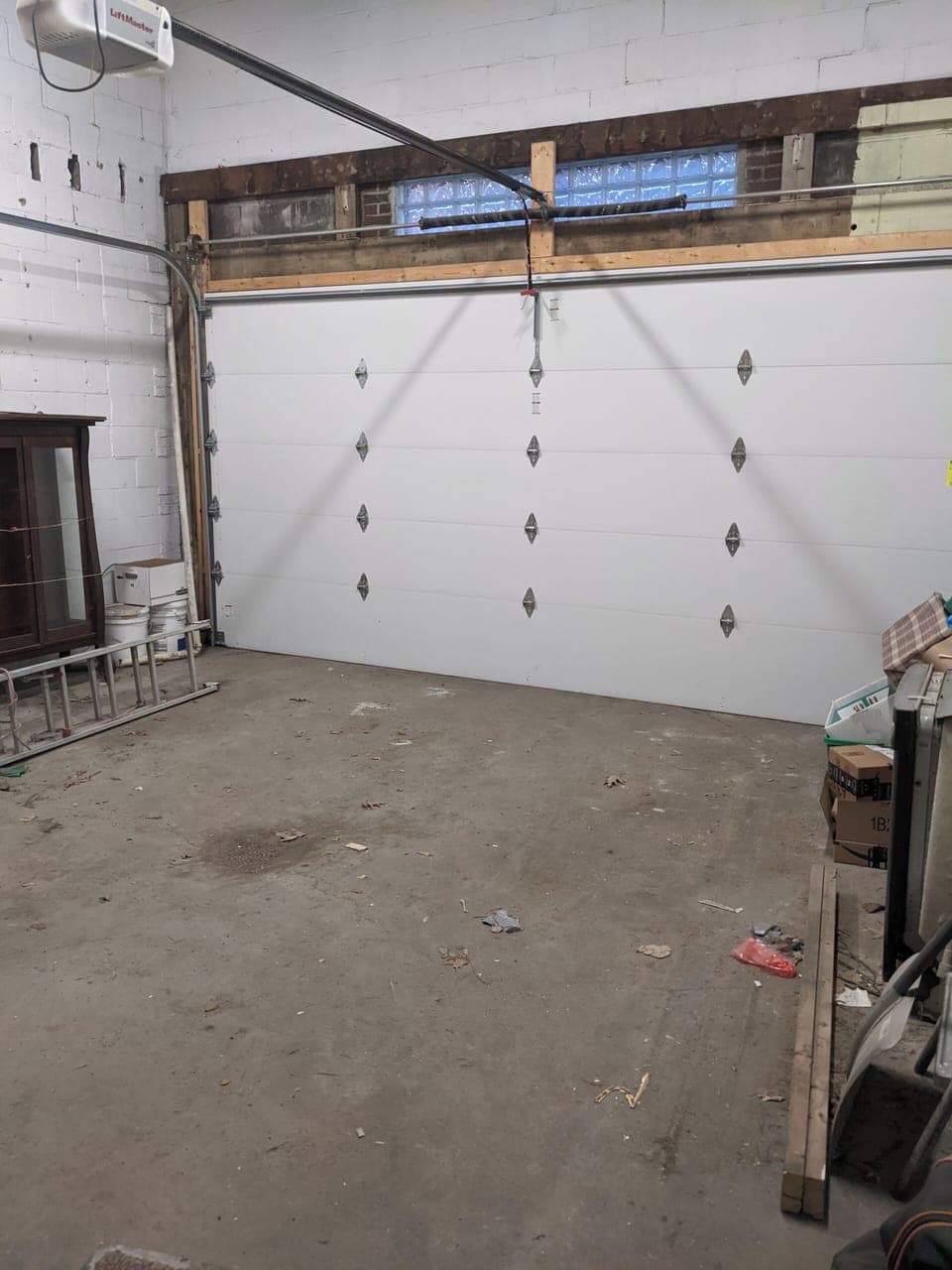 The garage is very large.   There is also an outdoor parking space in the back