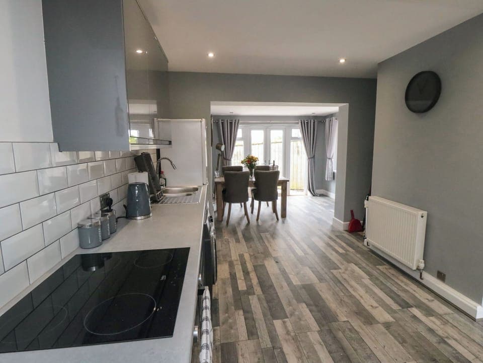 Fridge, electric kettle, cookware/dishes/utensils