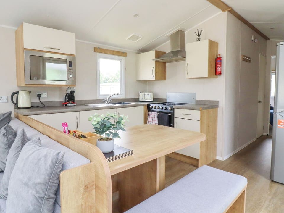 Fridge, electric kettle, toaster, cookware/dishes/utensils