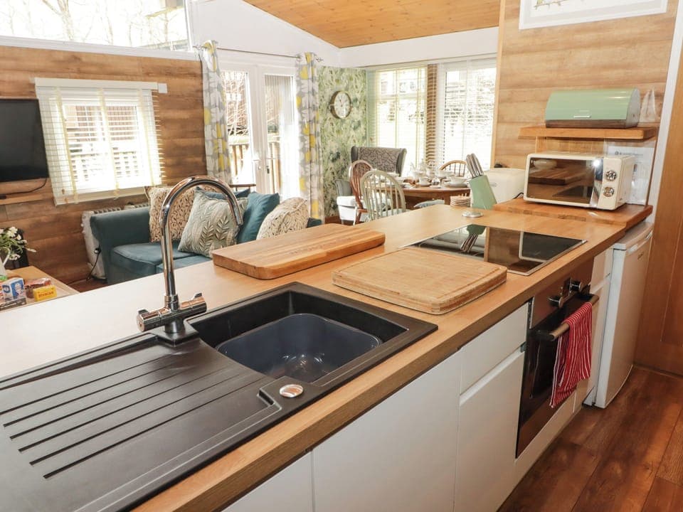 Fridge, electric kettle, toaster, cookware/dishes/utensils